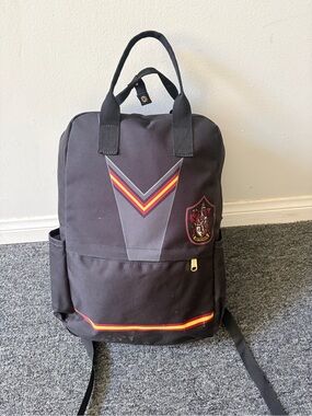 Loungefly Black Canvas Backpack with Red and Gold Accents